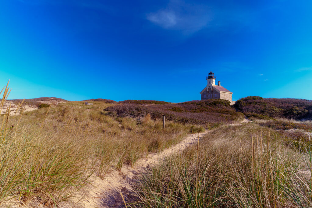 The dunes at Sandy Point with Block Island North Light in the background.