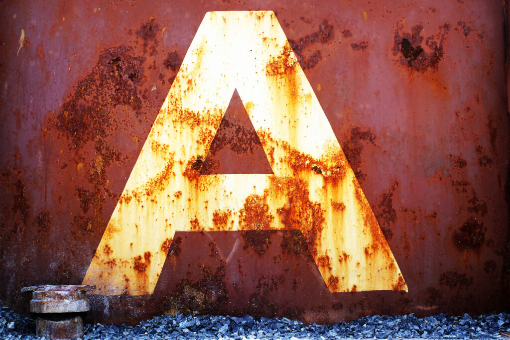 Rusted lettering along the Gowanus Canal