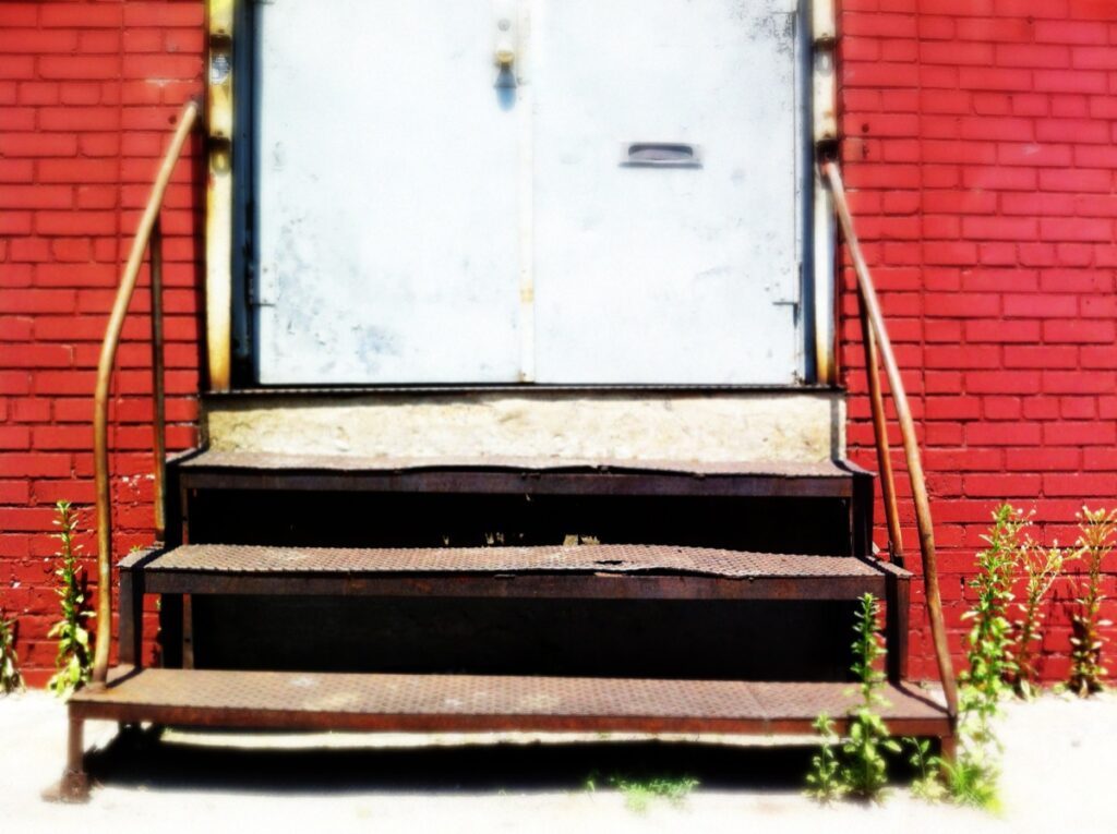 Rusted doorsteps on the east side of Newtown Creek